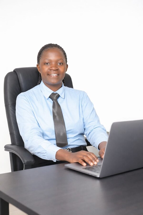 Victoria Wakoli, founder of EduCareer Connect Organization, at her desk